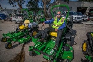 Stay Green Account Manager Dave Colburn gets ready to take a new propane mower for a spin.